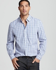 Relaxed enough for the weekend, refined enough for the work week, this classic-fitting button-down from Elie Tahari promises versatility and a big dose of effortless style.