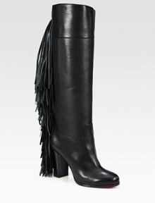 Rocker-chic fringe adds movement to this towering boot of sumptuous Italian leather. Stacked heel, 3½ (90mm)Shaft, 15½Leg circumference, 14Leather upperPull-on styleLeather liningSignature red leather solePadded insoleMade in Italy