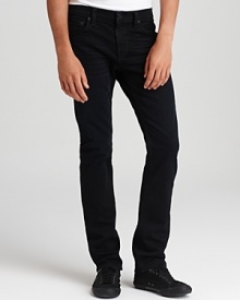 J Brand dresses up slim cut jeans with a rich, dark wash for denim that's fit for running errands or a night on the town.