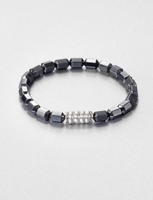 The Bedeg collection celebrates the simple, yet exquisite Indonesian artisanship found in woven bamboo with a modern design interpretation captured in traditional techniques. This beaded style is designed in sterling silver with hematite.Sterling silverHematitePusher claspDiameter, about 6Imported