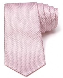 Incredible texture defines this luxurious silk tie from Michael Kors, the perfect pizzazz piece for special occasions or a fine addition to your professional wardrobe.