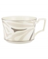 Abstract markings in soft shades of khaki fill in this glazed white china cup for unconventional elegance. From Noritake dinnerware, these dishes have matte platinum bands and an arched, geometric handle that look sharp on casual and formal tables alike.