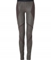 Build the foundations of your urban-cool wardrobe with Helmut Langs trend-favorite dusty olive patchworked leggings, perfect for pulling together modern-minimalist looks - Geometric patchworked lambskin, faux fly front, black elasticized waistband, back slit pockets - Pair with edgy knits and sleek ankle boots