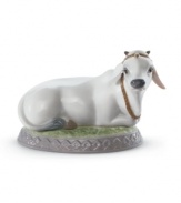 No ordinary moo cow, this handcrafted Lladro figurine puts one the world's most-sacred animals on an elegant porcelain pedestal.