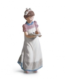 A thoughtful gift for the Lladro collector, the Happy Birthday figurine carries a delicious slice of cake to make the celebration doubly sweet.