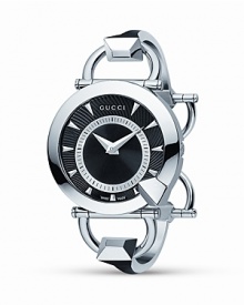 From the Chiodo Collection, Gucci times it right. Stainless steel case with black helical dial and a steel bangle. Jewelry clasp.