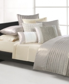 Embellished with pleated stripes along the top and bottom, Natori's Soho pillow sham has an undeniably modern sophistication. Featuring soft linen and cotton finished with a dazzling metallic sheen; button closure.