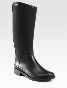 A twist on Hunter's classic rain boot, with an equestrian-style silhouette, nylon shaft and gleaming goldtone hardware.Rubber heel, 1¼ (30mm)Shaft, 14¾Leg circumference, 14Rubber and nylon upperBack zip with snap closureNylon liningRubber solePadded insoleImported