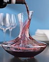 Stunning, rippled glass decanter offers optimal aeration as it enhances the presentation and aeration of your wine. These aerating waves help to open up your wine as you pour it in the decanter, swirl and serve. A wide base gives wine plenty of breathing room, while the angled mouth provides a dripless pour. Mouthblown of lead-free crystal 9¼H 47¼ oz. Hand wash Imported