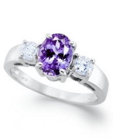 A true beauty. This stunning ring features an oval-cut tanzanite center stone (1-3/8 ct. t.w.) accented by round-cut diamonds on the sides (3/8 ct. t.w.). Set in 14k white gold.