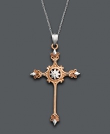 Show your devotion in intricate design. This unique pendant features an exquisitely crafted two tone cross in 14k white gold and 14k rose gold. Approximate length: 18 inches. Approximate drop: 1-3/4 inches.