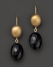 Faceted onyx shines darkly in 14K. yellow gold settings.