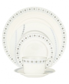 Connect the dots to playfully chic style with Breton place settings by Noritake. Tiny spots of sparkling platinum and white come together in delicate strands and sunbursts on modern bone china.