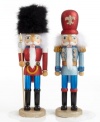 Attention! The soldier nutcrackers from Kurt Adler stand tall and proud, clad in uniforms that shimmer like the season in bright red and starry blue.