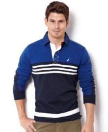 Stripes go sporty on this sharp color-blocked polo shirt from Nautica.