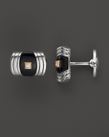 Striking onyx, a glittering diamond and bright 14K. gold enhance the gleam of sterling silver. By Dolan & Bullock. From the Stone Accent Collection.