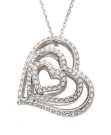 See things in black and white. This exquisitely crafted Swarovski pendant features an elaborate heart motif. One side is embellished in jet crystal pavé, while the other sparkles in clear crystal. You can choose the black or white effect according to your outfit or mood. Pendant and chain crafted in silver tone mixed metal. Approximate length: 17-1/2 inches. Approximate drop: 1-1/8 inches.