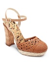 Cork and jute accents make the Sam Edelman Rella sandals a unique summer standout, while a chunky block heel fits right in with the season's footwear trends.