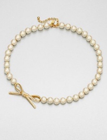 From the Skinny Mini Collection. A classic strand of lustrous faux pearls, sweetly accented with a sparkly bow.Faux pearlsRhinestonesGoldtoneLength, about 18Lobster claspImported