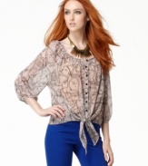 A geometric print adds edge to this retro-inspired Bar III tie top -- contrast it over colored denim!