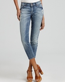 Subtle distressing and a faded wash lend a cool vintage feel to these 7 For All Mankind cropped skinnies.