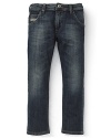 Diesel's medium wash jean elevates a classic utility style with a rich blue rinse and carefully-wrought detailing.