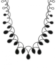 Onyx gets the teardrop treatment to glamorous effect. Genevieve & Grace's necklace, set in sterling silver, also features marcasite to enhance the appeal. Approximate length: 17 inches. Approximate drop: 1-3/8 inches.