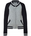 Luxury gets casual with this black and white lambswool sweater - Designed in a varsity style with zipped front, round neck and side zip pockets - Features contrasting sleeves and stripes at ribbed hem and cuffs - Perfect basic with a tee shirt and jeans, corduroys or chinos, or with a skirt and tank top