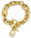 Add a touch of designer to your style. Michael Kors MK logo lock bracelet features a gold tone mixed metal setting with a trendy toggle clasp. Approximate length: 8 inches.