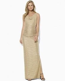 A draped cowl neckline imparts chic, sophisticated style to an elegant evening gown, tailored from softly crinkled jersey with glistening metallic specks for an eye-catching appeal.