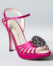 In hot rose satin, these bejeweled strappy sandals from Caparros add colorful glamour to a fashionable evening.