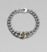 A chunky strand of graduated sterling silver links includes two with a cabled texture and one of smooth 18k gold. Sterling silver and 18k yellow gold Length, about 7½ Lobster clasp Made in Italy