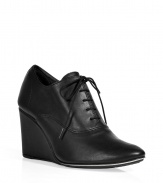 Channel trend-right style in these lace-up wedges from Repetto - Round toe, lace-up front, wedge heel - Style with pleat-front shorts, a tie-neck blouse, and an oversized cardigan