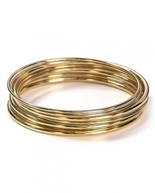 Give your look a shining finish with this gleaming set of gold plated bangles from Lauren by Ralph Lauren.