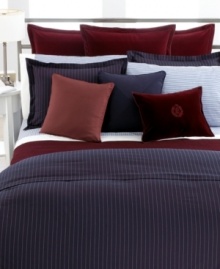 Featuring a rich burgundy hue, luxurious cotton velvet weave and logo embroidery at the center, the Greenwich Modern Euro sham from Lauren Ralph Lauren lends sophistication to any bedroom.