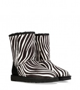 With a wild zebra print and undeniably cozy interior, these haircalf boots from UGG Australia lend comfort and style to your cold weather look - Round toe, black rubber sole, exposed seams, side button detail, contrasting back counter suede panel, cozy shearling lining - Hits above the ankle - Pair with favorite jeans, bright knits, and sporty outerwear