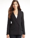 THE LOOKTuxedo lapel Double breasted button front Long sleeves Welt and flap pockets at hipsTHE FITAbout 28 from shoulder to hemTHE MATERIAL95% wool/5% Lycra spandex Fully linedCARE & ORIGINDry clean Imported