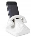 Stay in touch with classic sensibility. Jonathan Adler's playful Smart Phone dock holds most of your handheld phone and music devices inside a traditional porcelain design.