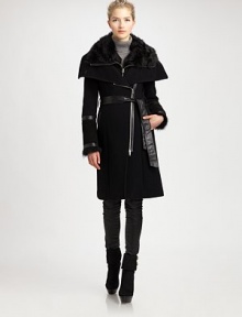 A jacket that offers a brilliant combination of buttery leather and luxurious toscana sheep fur. Its asymmetrical zipper adds to this style's sartorial mystique.Asymmetrical front zipperLambskin leather and fur detailsSlash pocketsSelf-tie beltFully linedAbout 40 from shoulder to hem70% wool/20% polyamide/10% cashmereDry clean by fur and leather specialistImported of Italian fabricFur origin: Turkey Model shown is 5'10 (177cm) wearing US size Small. 