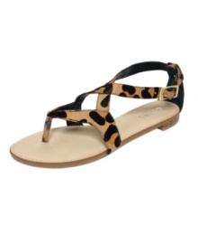 Safari sophistication: The hunt for the perfect everyday sandal is over, with the Palban by GUESS. The leopard print straps lend exotic ferocity.