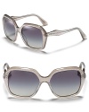 Up the style ante in angular sunglasses with gradient lenses from Miu Miu.