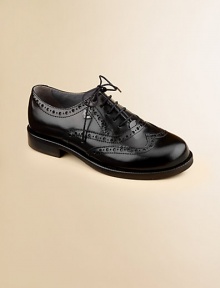 Constructed in the softest leather, this classic oxford is designed in a lace-up silhouette with intricate cut-out details.Lace-upLeather upperLeather liningRubber solePadded insoleImported