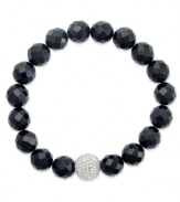 A traditional style with bold, modern appeal. This chunky bracelet showcases faceted onyx beads (10 mm) and a sparkling crystal ball at center (12 mm). Bracelet stretches to fit wrist. Approximate length: 7 inches.