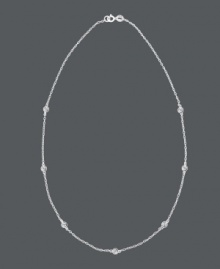 Subtle style with a hint of sparkle. B. Brilliant's pretty station necklace features bezel-set cubic zirconias (3/4 ct. t.w.) strung from a delicate chain. Crafted in sterling silver. Approximate length: 18 inches.