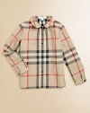 Timeless Peter Pan collar and classic check pattern on a plush cotton button-down design.Peter Pan collarLong sleeves with button tab cuffsButton-frontCottonMachine washImported