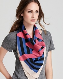 SONIA RYKIEL's script signature is emblazoned across the middle of this striped scarf from the French designer.