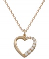 Madly in love. Reveal your inner romantic with City by City's sparkling cubic zirconia open heart pendant necklace (3/4 ct. t.w.). Crafted in gold tone mixed metal, it's nickel-free and appropriate for sensitive skin. Approximate length: 15 inches + 3-inch extender. Approximate drop: 1/2 inch.