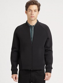 A unique take on the classic bomber jacket featuring sporty raglan sleeves.Raglan sleevesConcealed front zipperAbout 25 from shoulder to hem64% polyester/31% cotton/5% spandexHand washImported