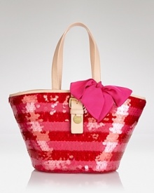 Put some sparkle in your purse portfolio with Juicy Couture's straw tote, boasting bright stripes and a big bow. In glamourous style, this bag screams girlie-girl.