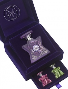 Stashed securely in the top drawer of a bi-level jewel box is a 1.7 oz. Swarovski gem-encrusted bottle of the Scent of Peace, its dove and curlicue design delicately traced with Swarovski stones. Down below are two miniature flacons both containing the Scent of Peace, covered all over in purple velvet and amethyst Swarovski gems. Made in USA. 